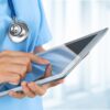 Healthcare worker with ipad