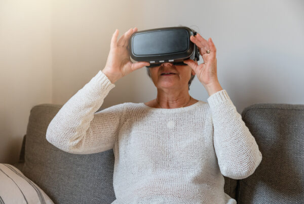 Elderly lady using VR